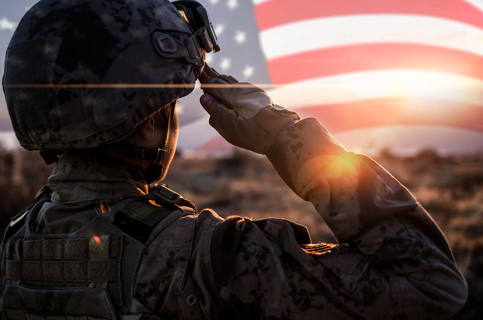 US military veteran saluting against the American flag